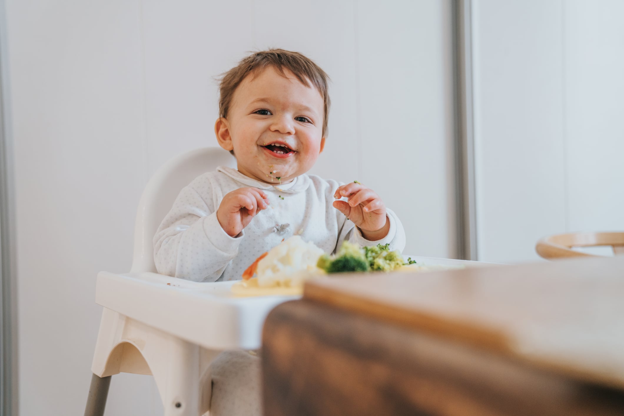 Baby eating vegetables